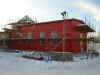 2006-01-27 Den röda väggplåten är uppsatt.